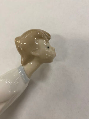 Lladro "Boy Blowing Kiss" Porcelain Figure