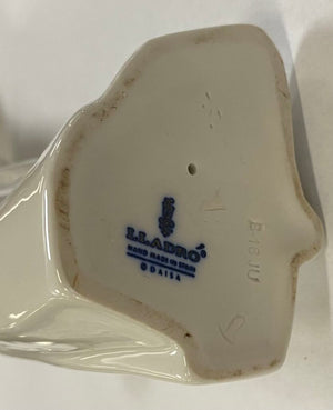 Lladro "Boy Blowing Kiss" Porcelain Figure