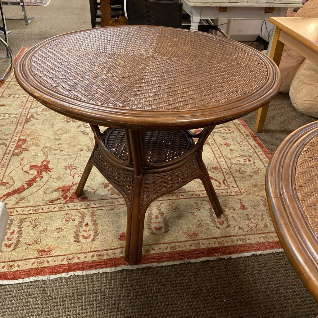 Round Wicker Table 37x30" H by Miss Daisy's Consignment & Auction House